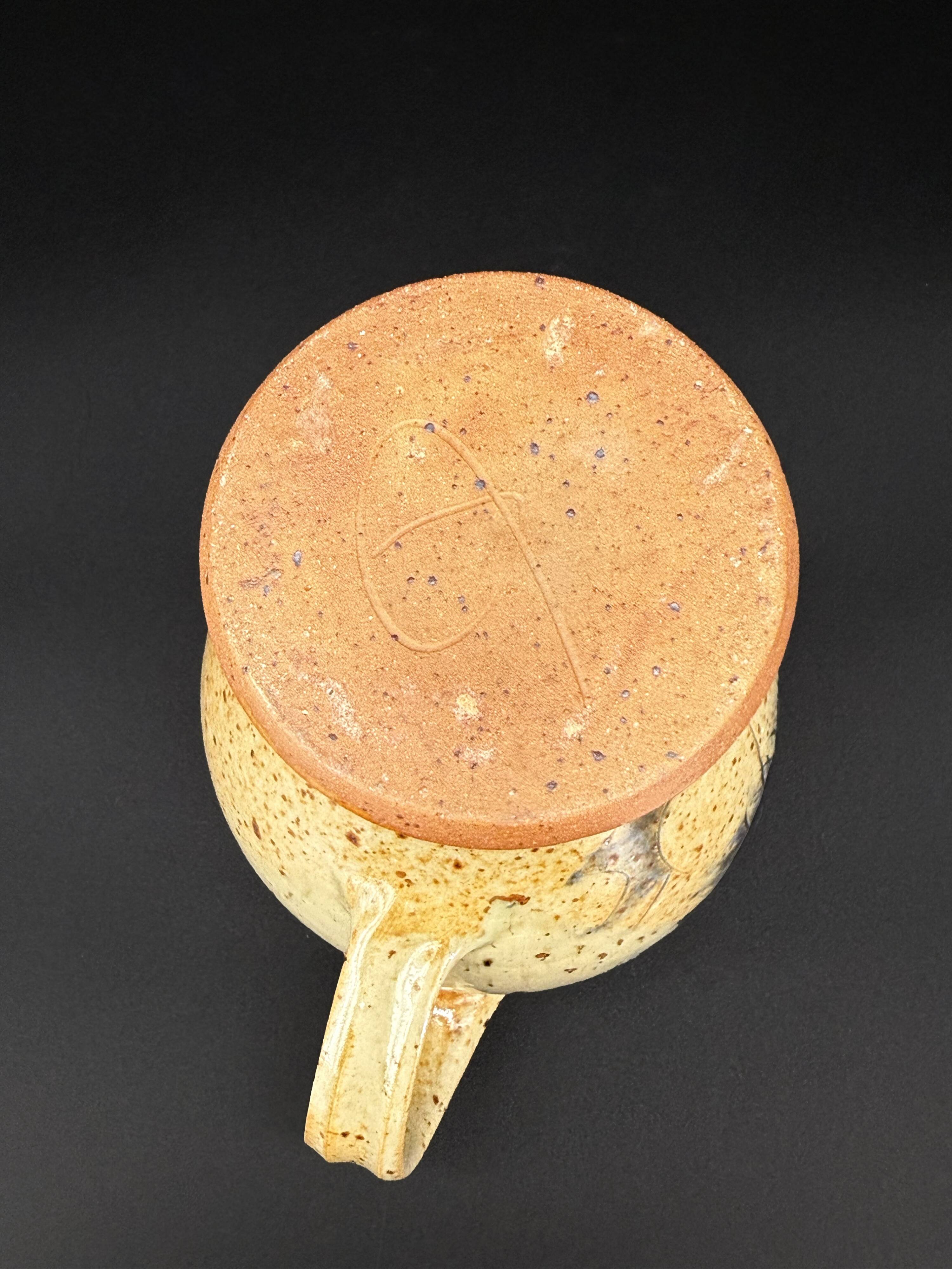 Stoneware pitcher signed Suzanne Dauliach – Incised Floral Thistle Decor