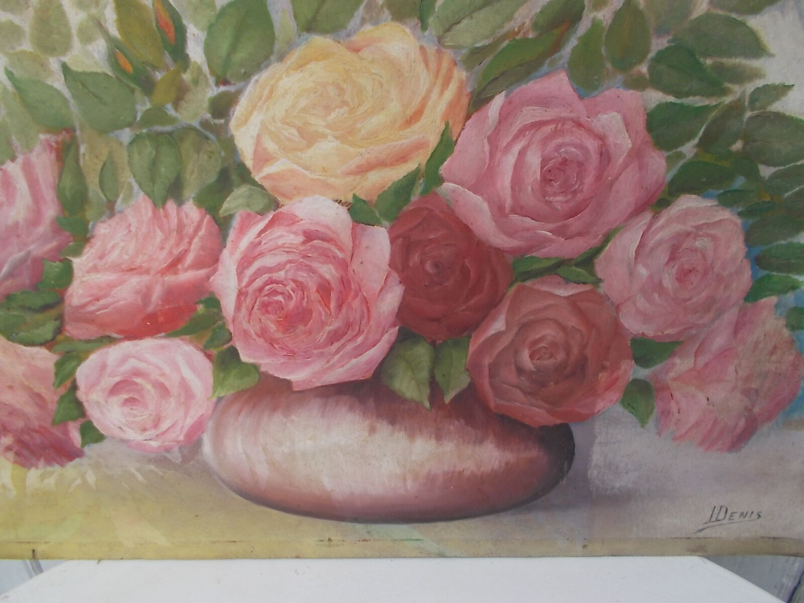 Tableau of a bouquet of flowers on a double-sided wooden panel.