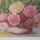 Tableau of a bouquet of flowers on a double-sided wooden panel.