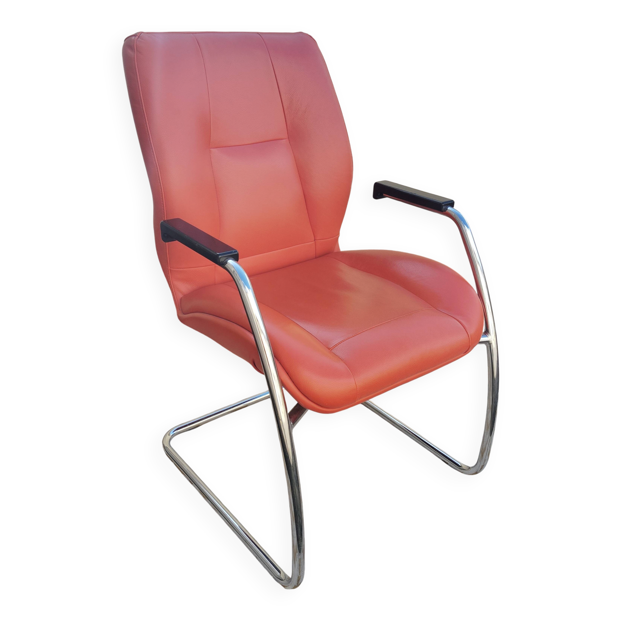 Orange leather cantilever tubular armchair