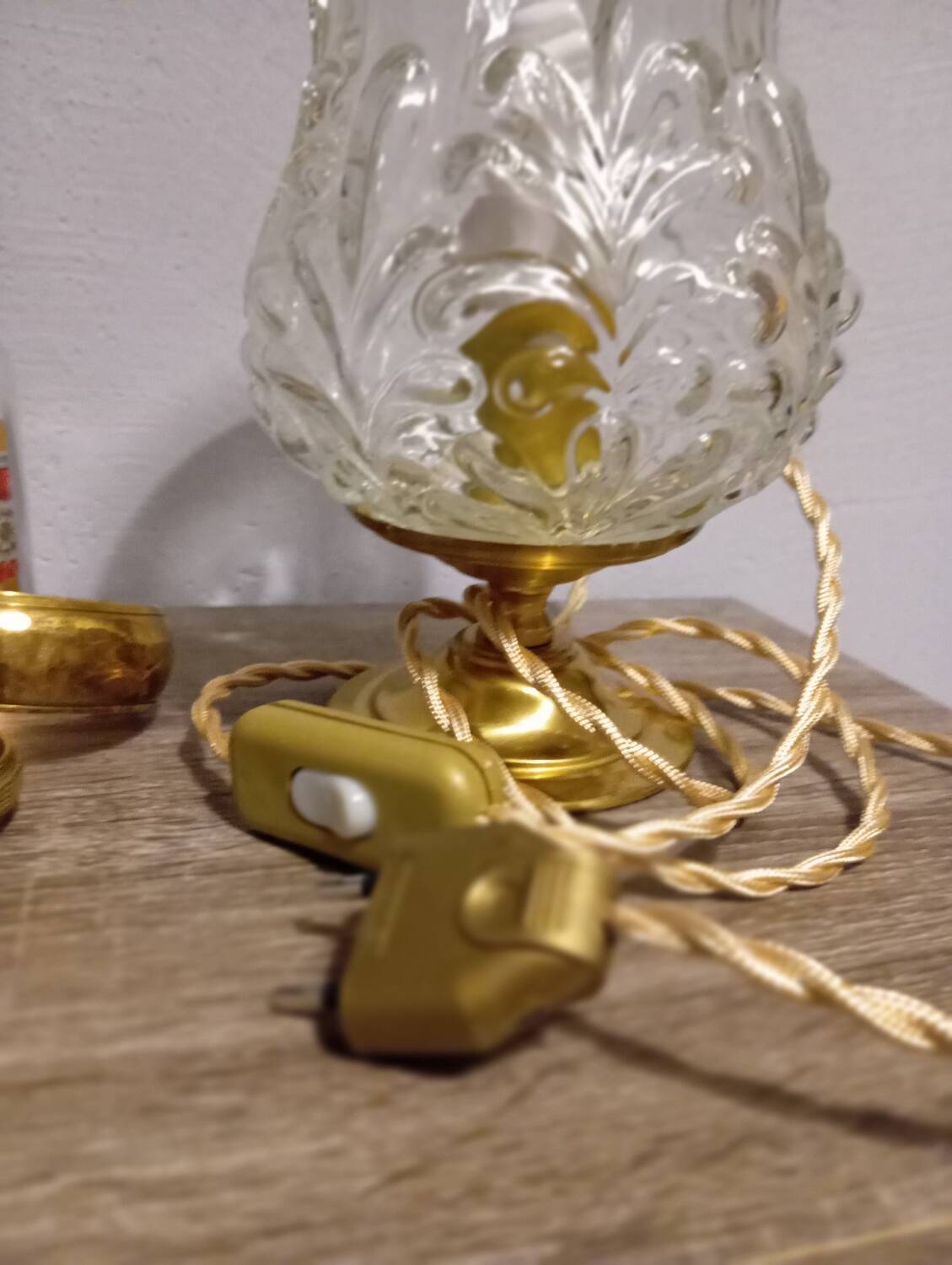 Brass foot table lamp, transparent textured molded globe, art deco style