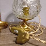 Brass foot table lamp, transparent textured molded globe, art deco style