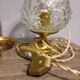 Brass foot table lamp, transparent textured molded globe, art deco style