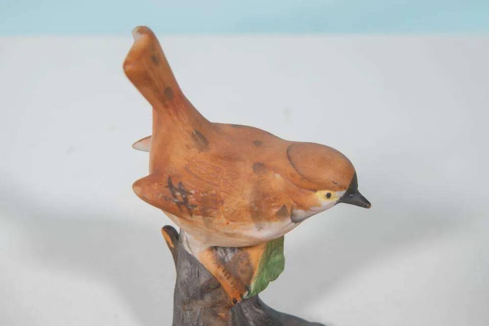 Vintage porcelain bird statuette from the sixties.