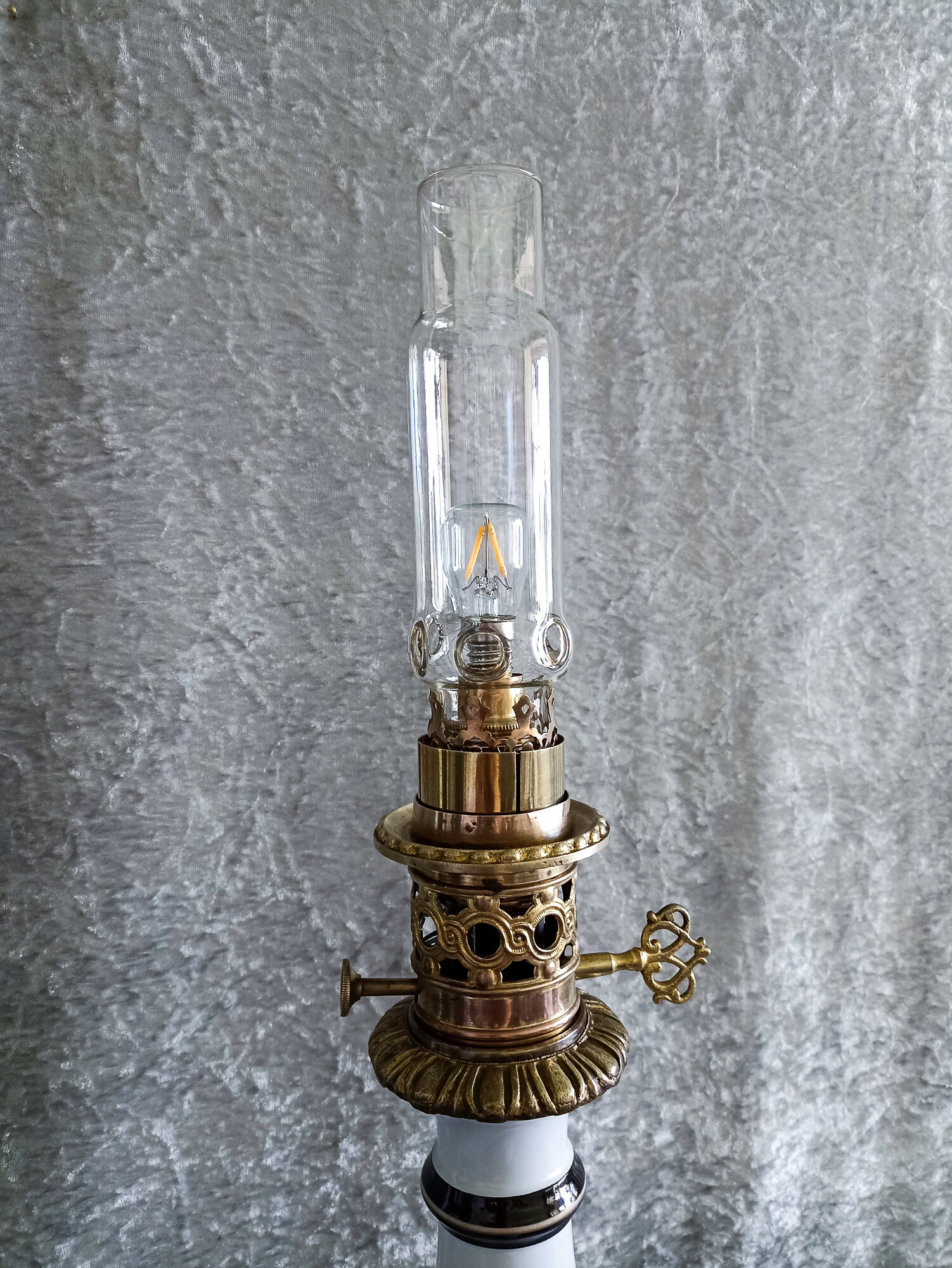 Old electrified porcelain oil lamp