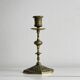 Carved brass candlestick holder