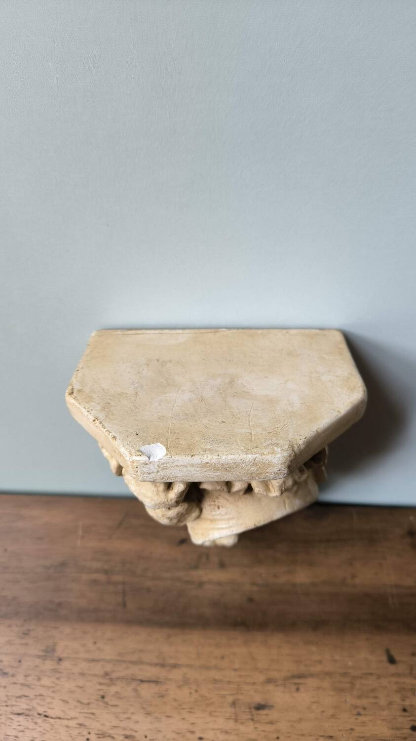 Small wall console shelf in vintage patinated plaster with baroque foliage