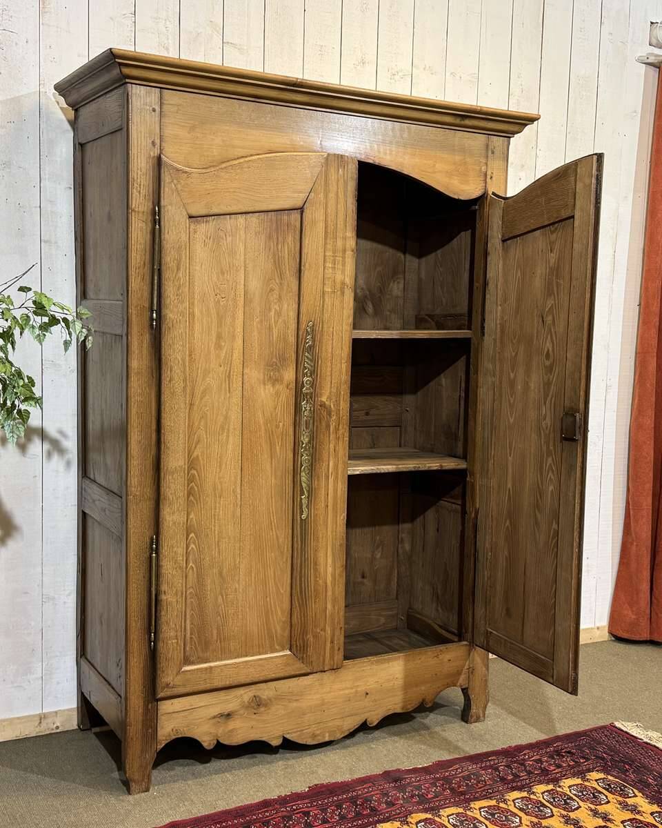 19th-century country wardrobe in blonde chestnut.