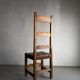 2 brutalist carved wood dining chairs with leather seat | The Netherlands | 1970s