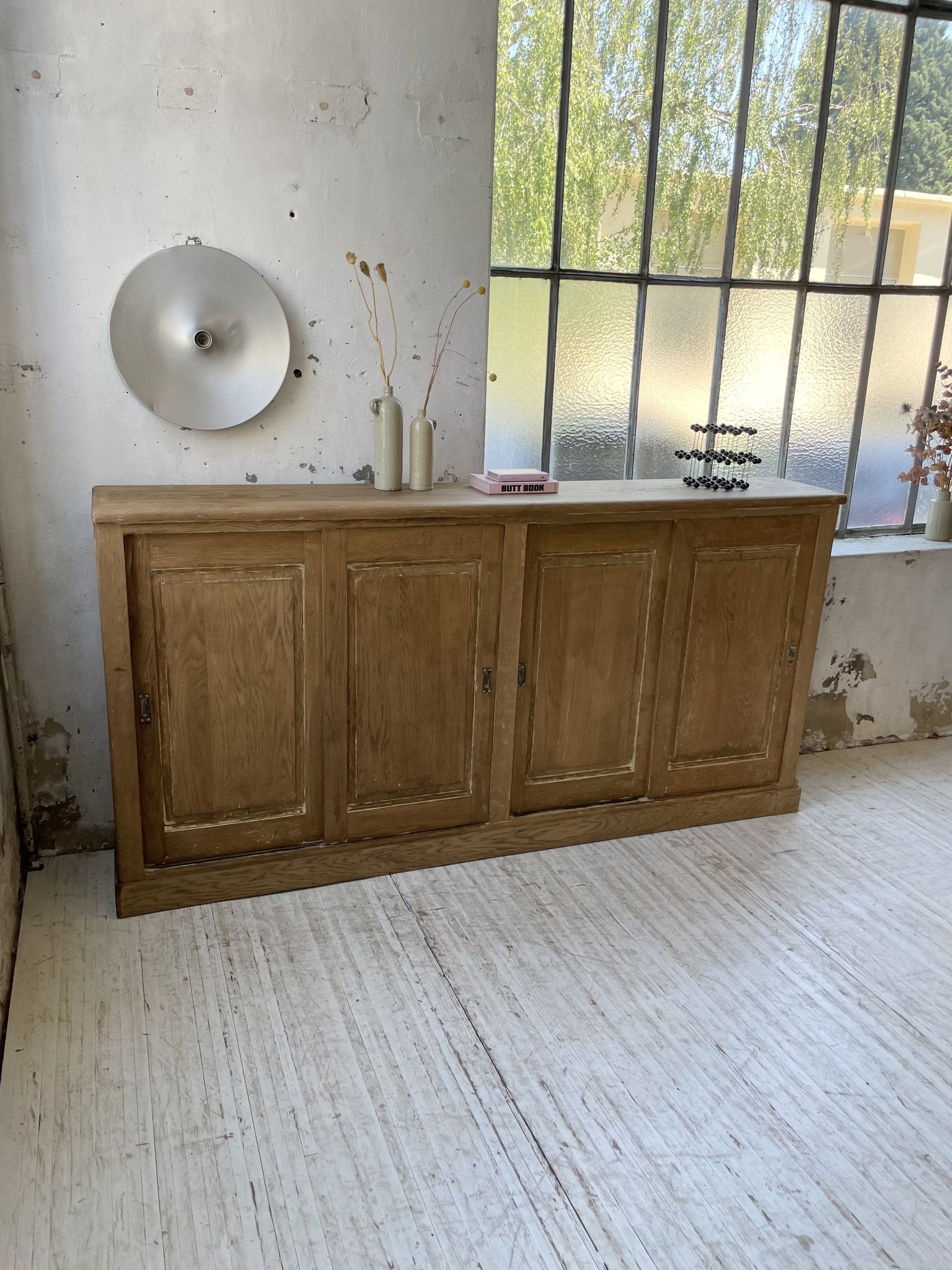 Large row of solid oak loom sliding doors