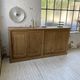 Large row of solid oak loom sliding doors