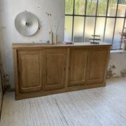 Large row of solid oak loom sliding doors
