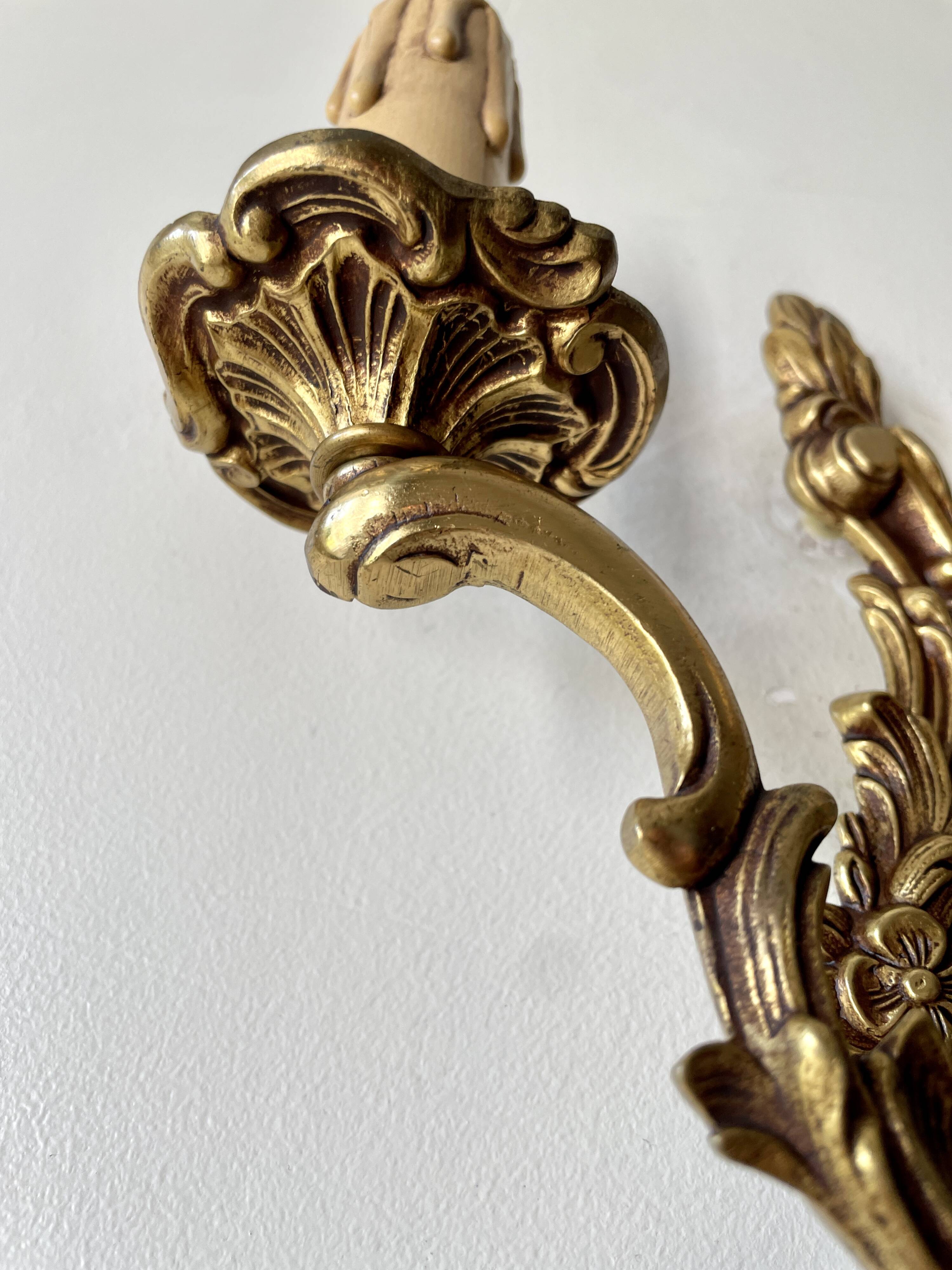 Pair of rocaille bronze wall sconces