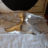 Sauce boat on a scalloped tray in silver metal