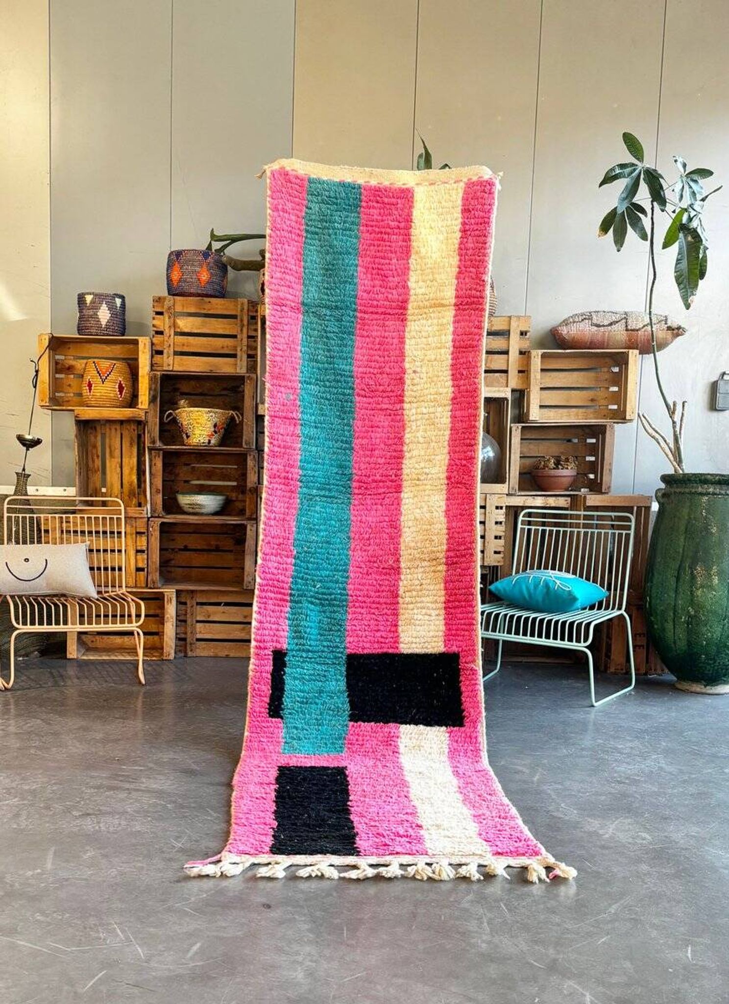 Moroccan Berber rug corridor in pink and blue wool.