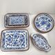 Set of 6 ceramic presentation plates in white and blue, floral pattern with woven wicker frame, 1970s/80s.