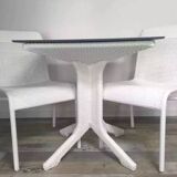 White woven resin garden chair