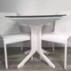 White woven resin garden chair