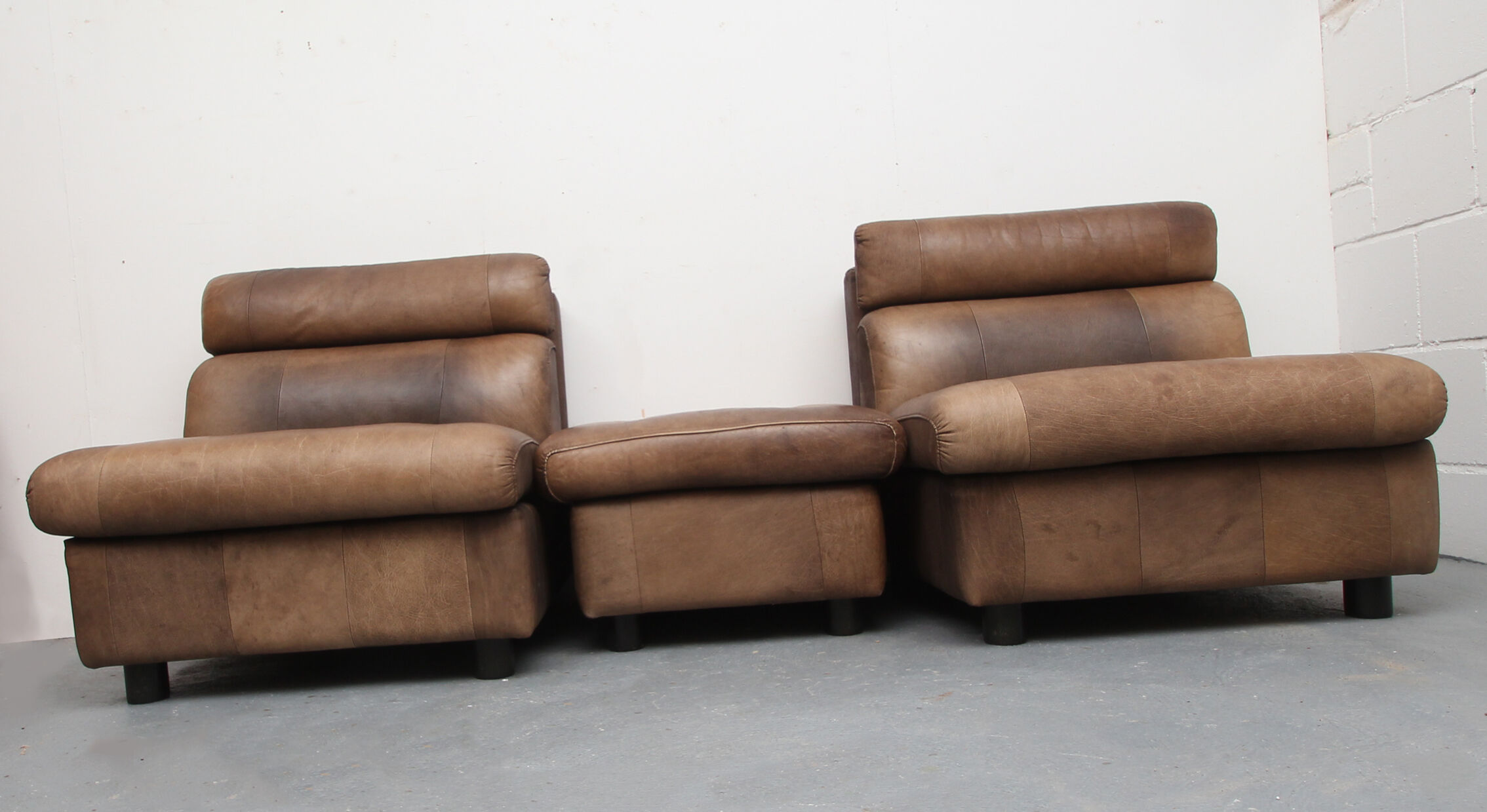 1970s buffalo leather set of 2 chairs and footrest