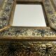 Eglomisé mirror with wooden parecloses
