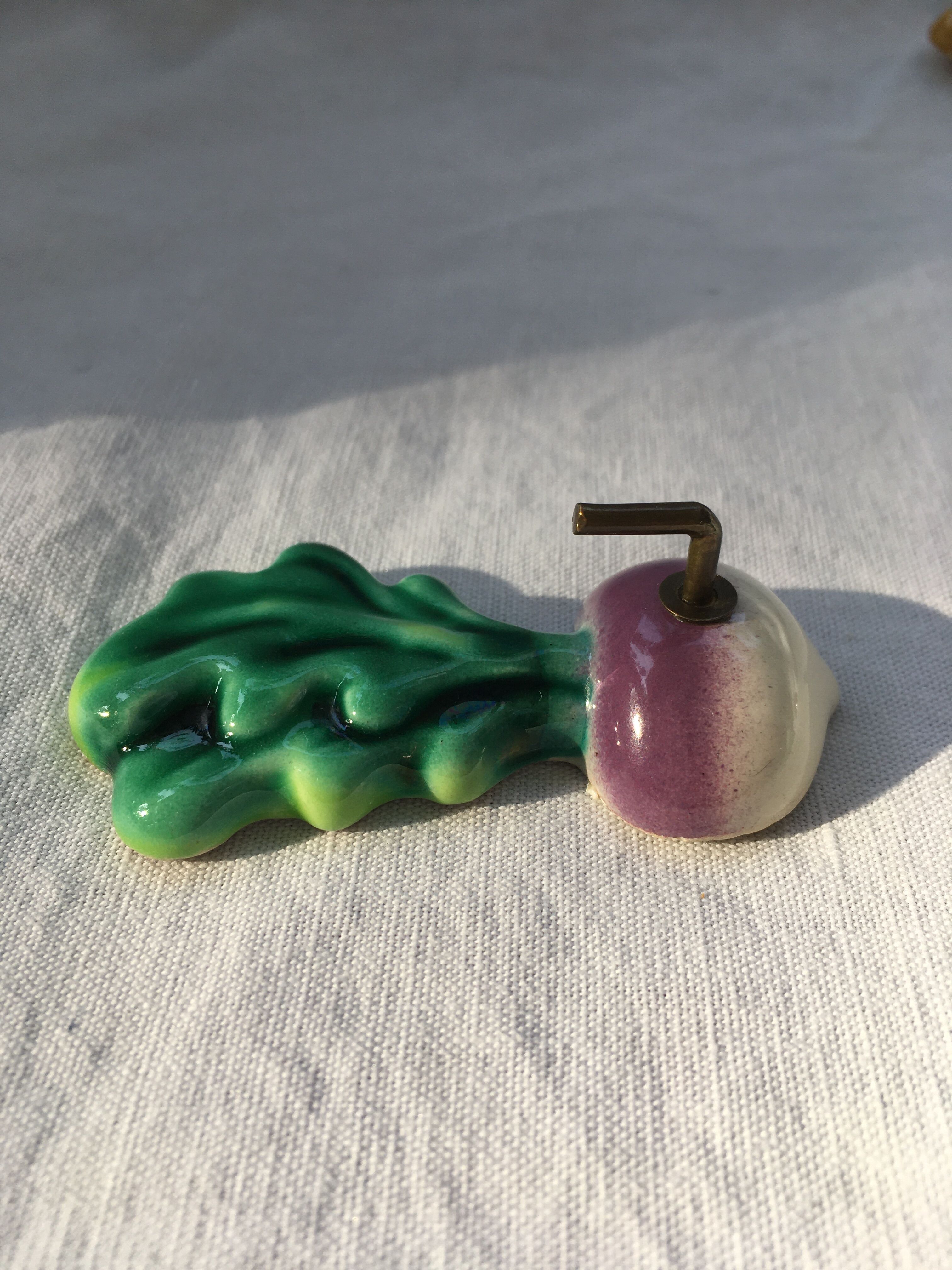 Lot of slurry hooks in the shape of plants and animals