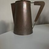 Modernist Italian pitcher design from the 1960s in patinated wood and metal.