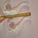 set of 2 vintage white cast iron hooks, small paint chips from the year