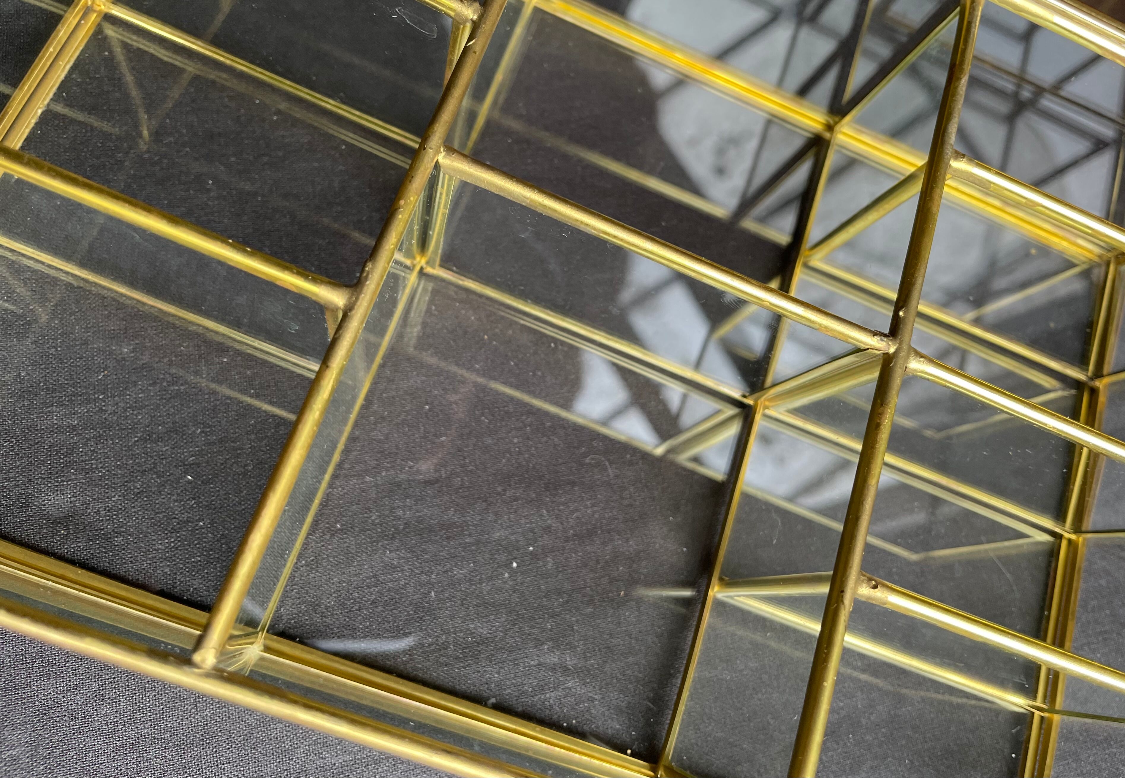 Glass and brass wall display case