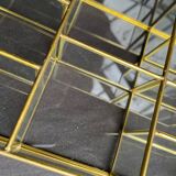 Glass and brass wall display case