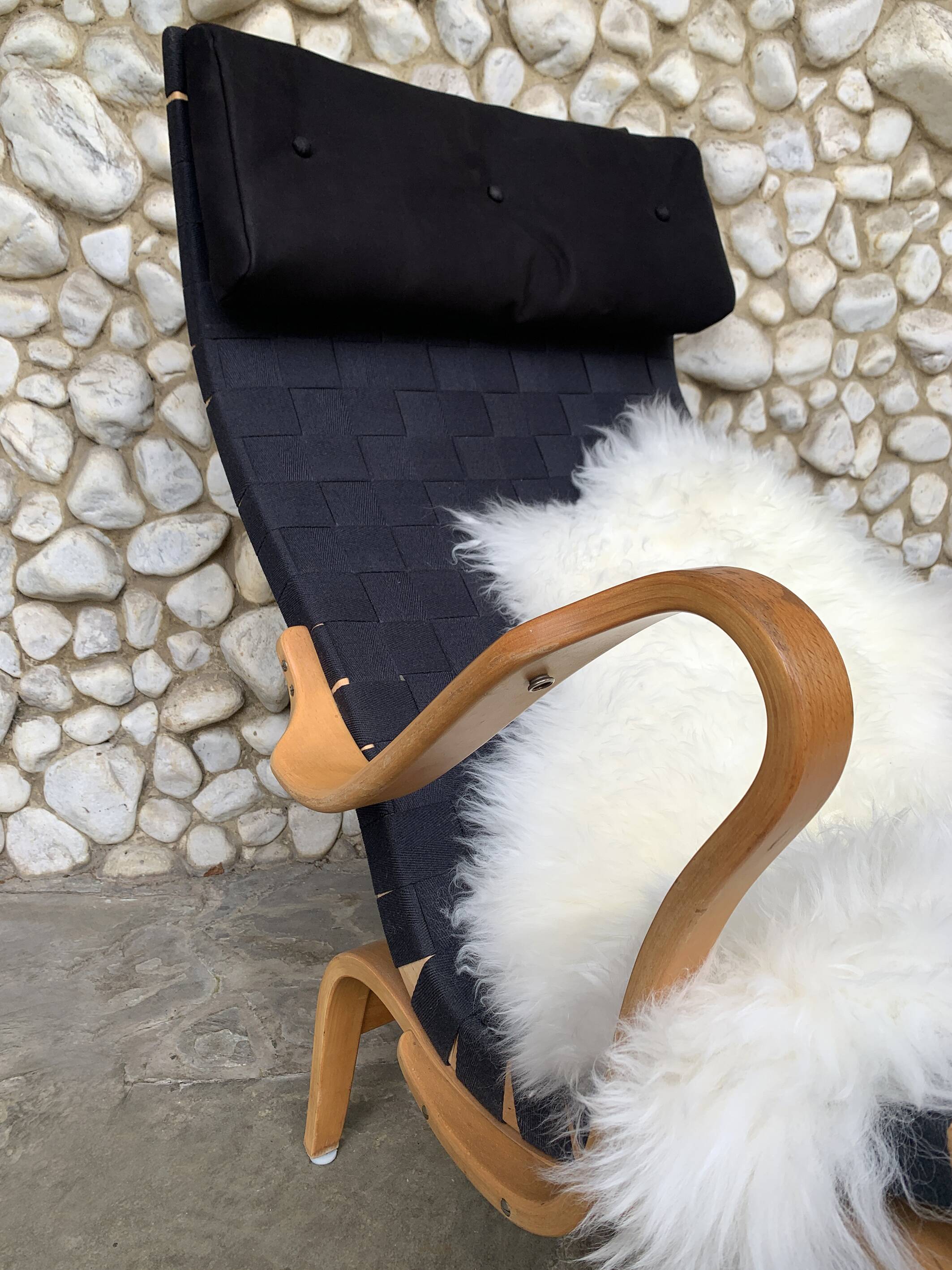 Pernilla armchair in black canvas by Bruno Mathsson, Dux, Sweden 1970