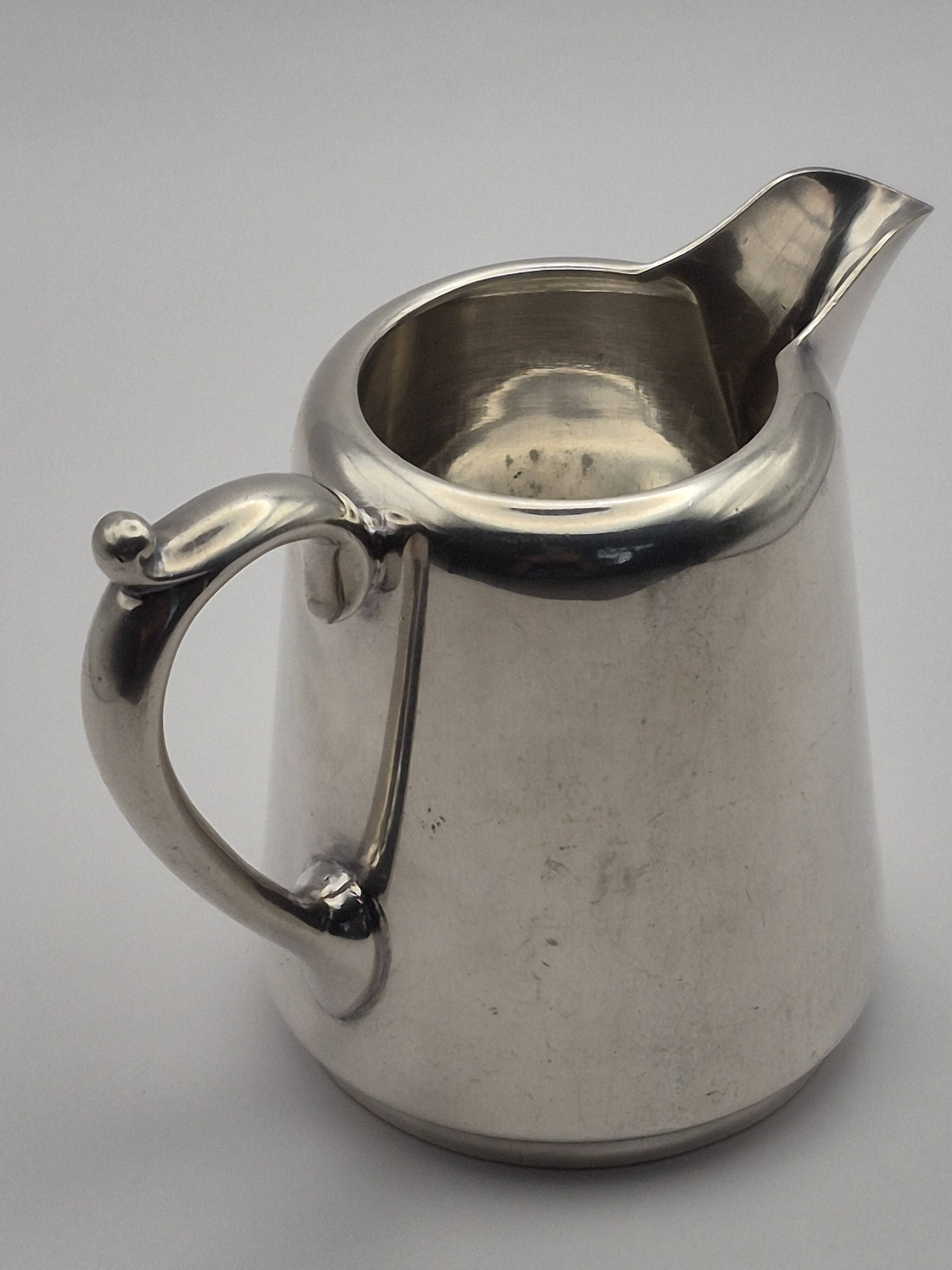 Superb vintage cream jug from the prestigious silversmithing house.
