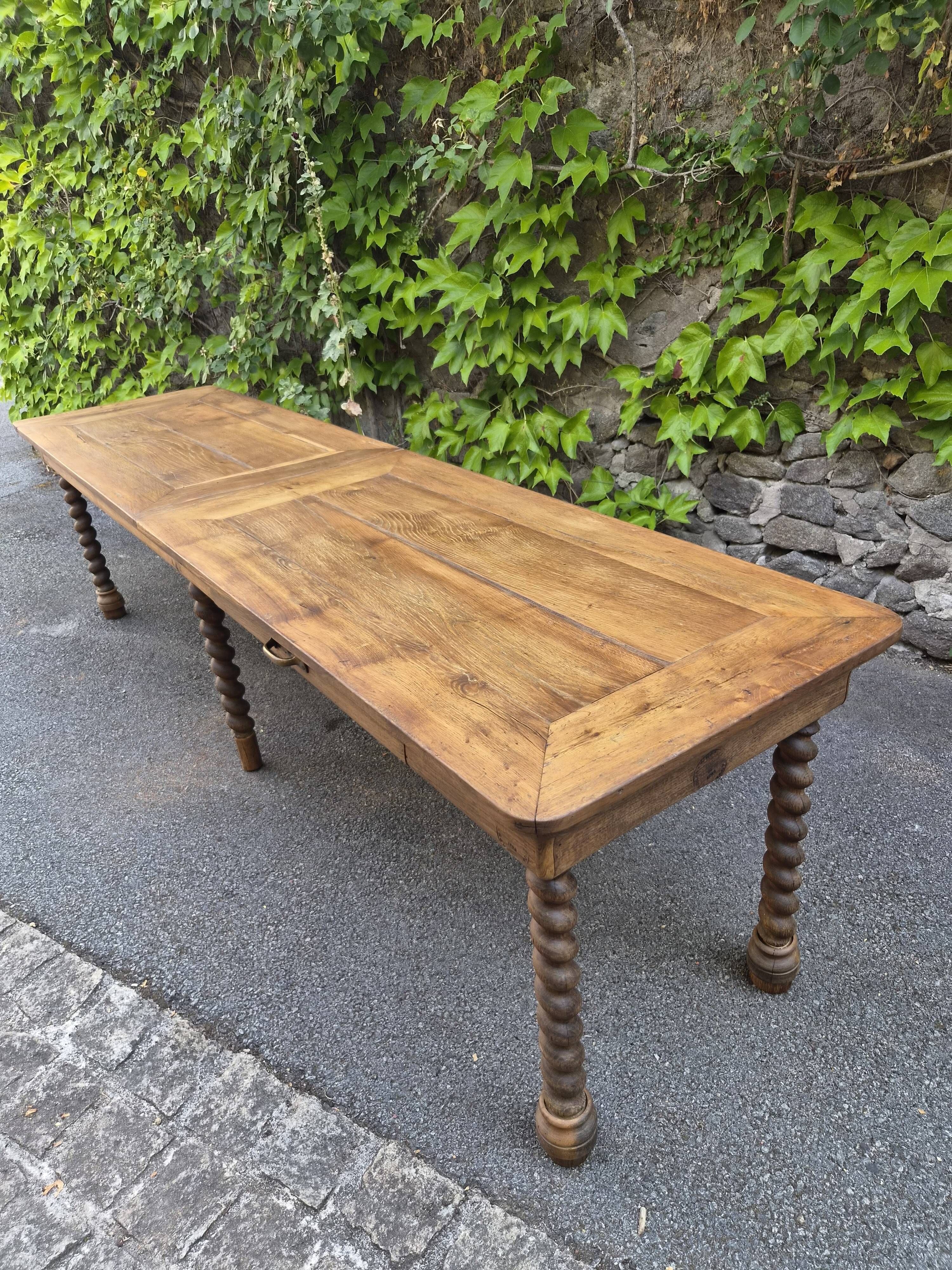 Antique French draper's table in oak, shop counter, work table, 6 feet, circa 1750–1850.