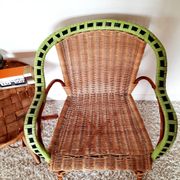 1950s 60s rattan armchair with green apple and black piping.