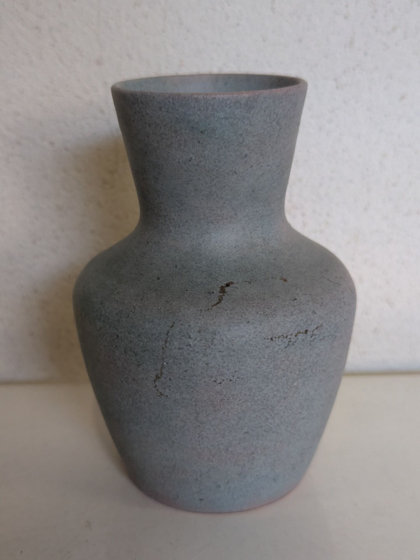 Small blue-grey glazed stoneware vase signed CB, studio work, year