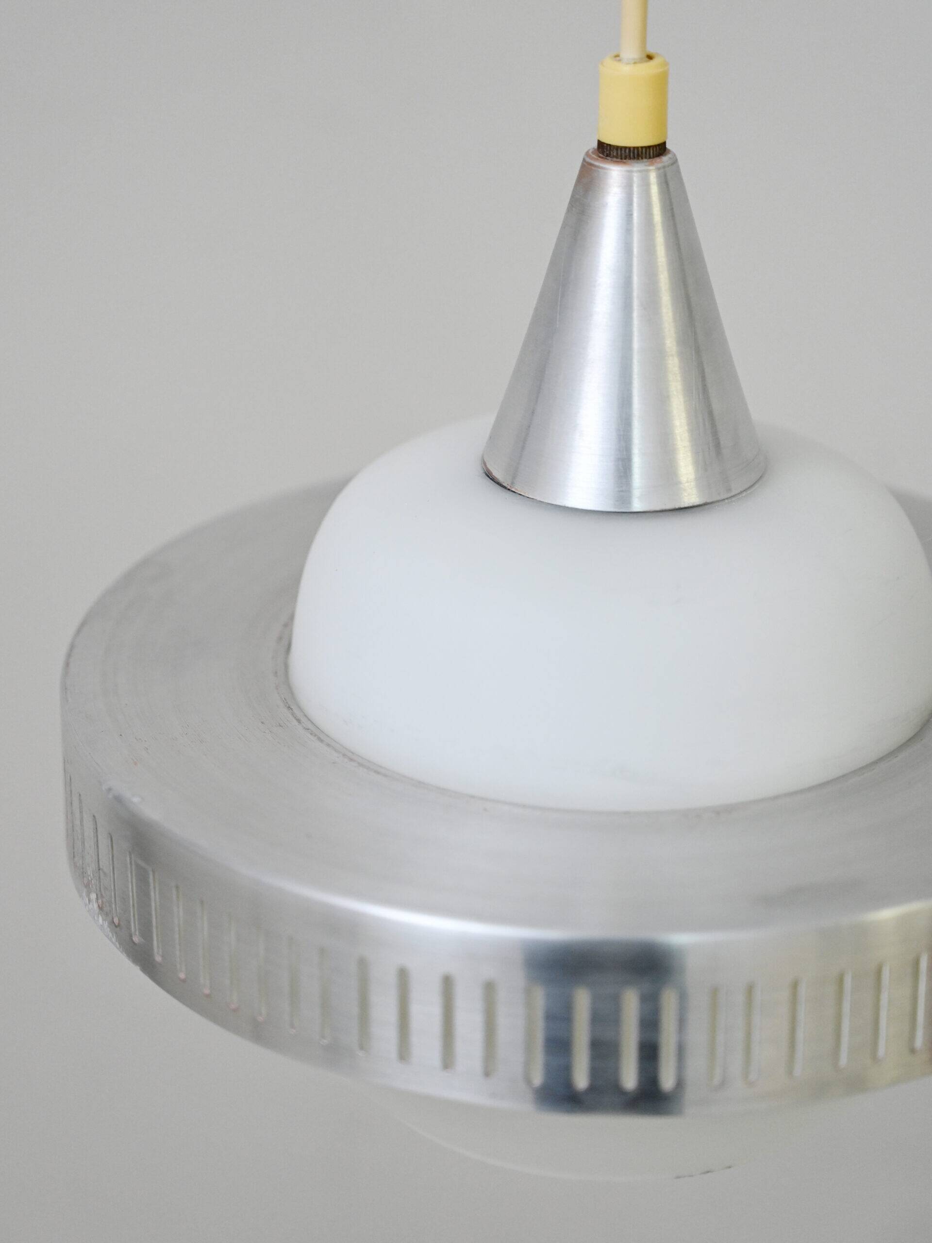 Glass and metal pendant lamps