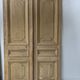 Pair of Haussmann-style double passage doors in patinated oak from the 19th century.