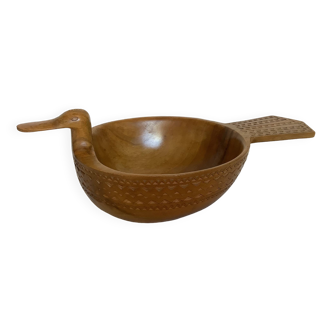 Carved wooden bird pocket