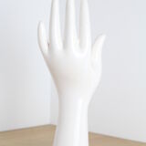 White hand ceramic ring sizer doilies