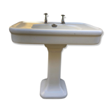 Antique washbasin on ceramic column