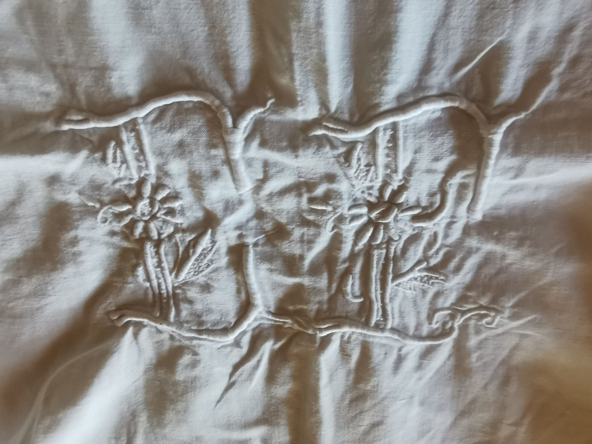 Old monogrammed fabric
