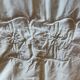 Old monogrammed fabric