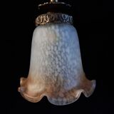 Brass wall lamp with speckled glass tulip