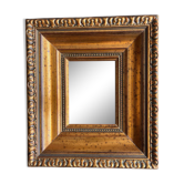 Miroir en bois mouluré doré
