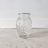 Small transparent molded glass vase
