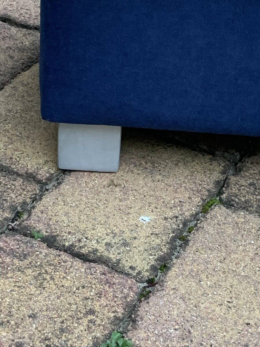 Mid-century blue fabric ottoman stool, 1950s compact modernist design.