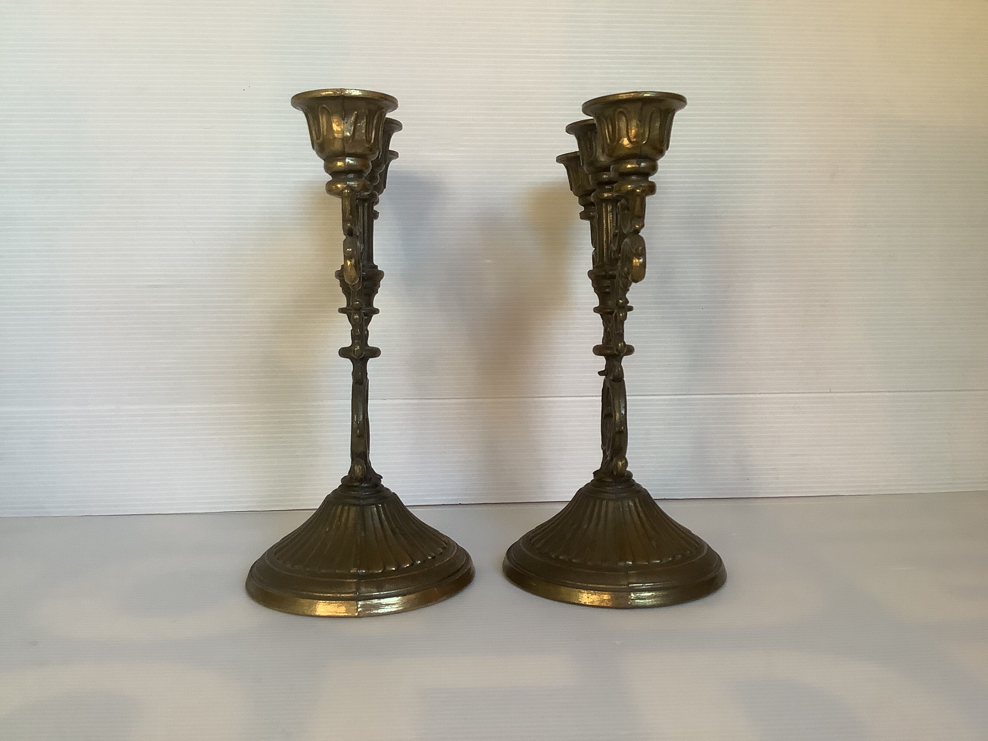 Pair of baroque brass candle holders