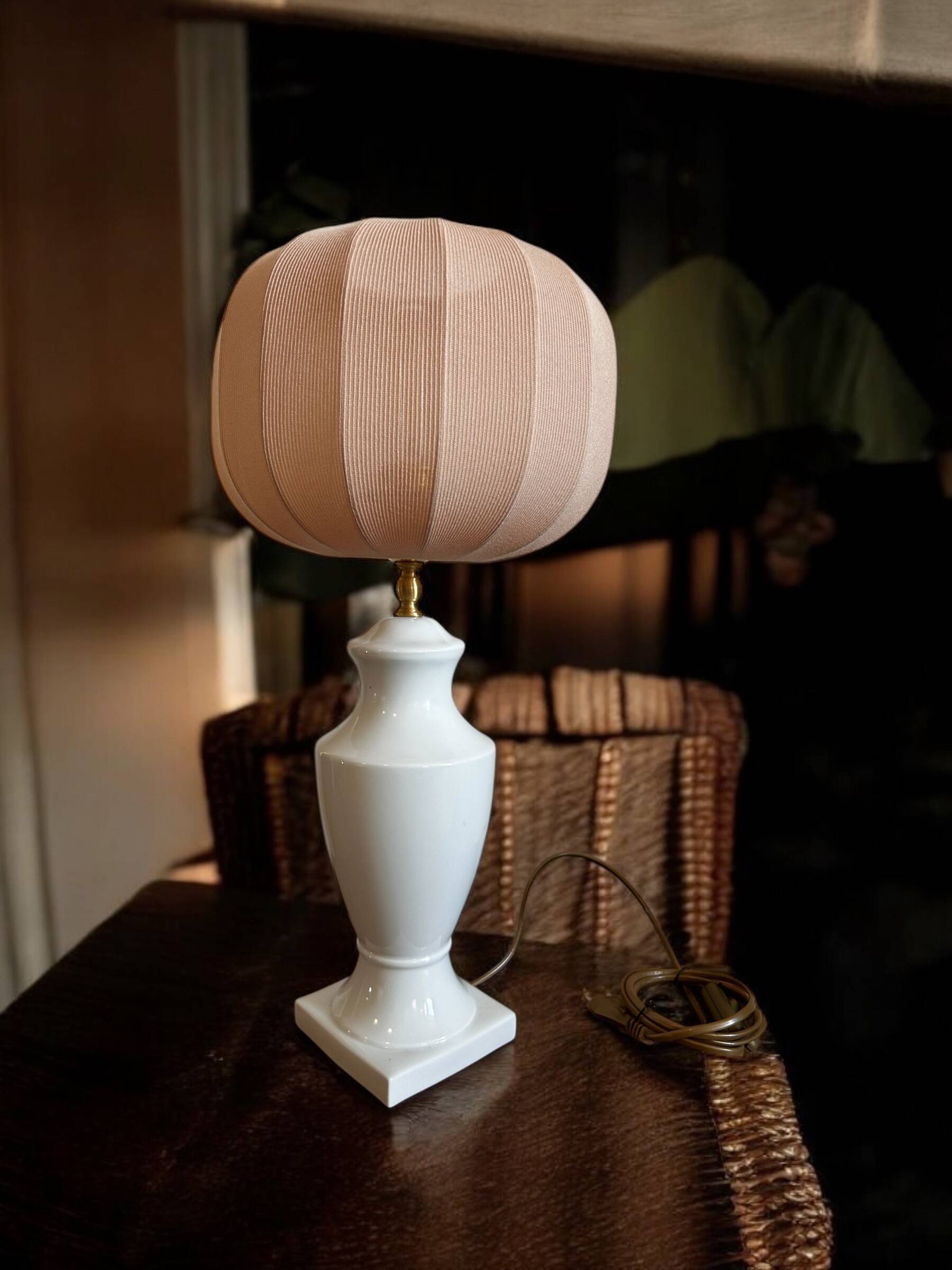 White ceramic table lamp with pastel shade