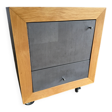 Natural wood side cabinet with dark grey perforated metal fronts on wheels (solid wood & metal)