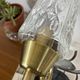 Pair of wall sconces in brass with square tulip glass shades.