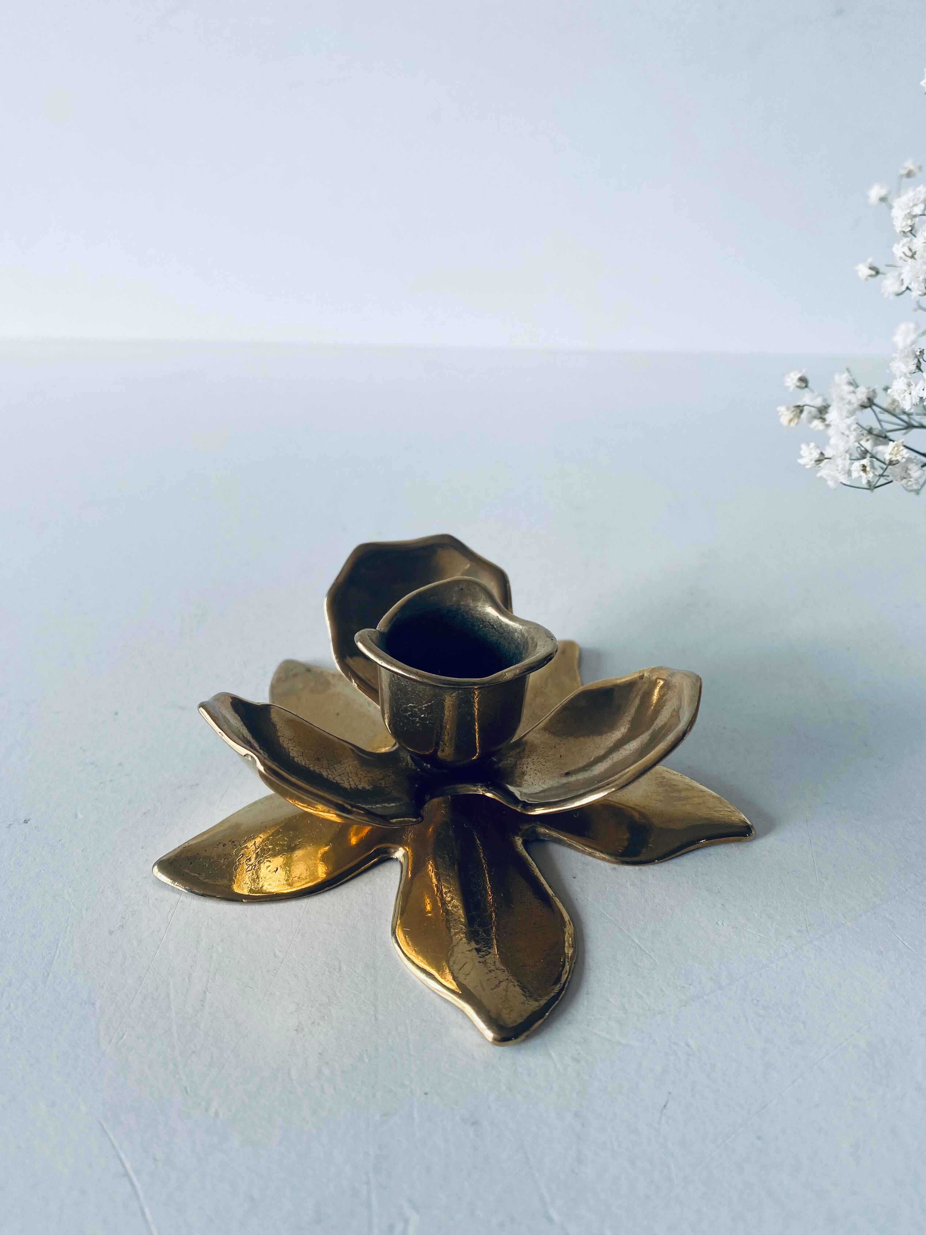 Brass flower candlestick